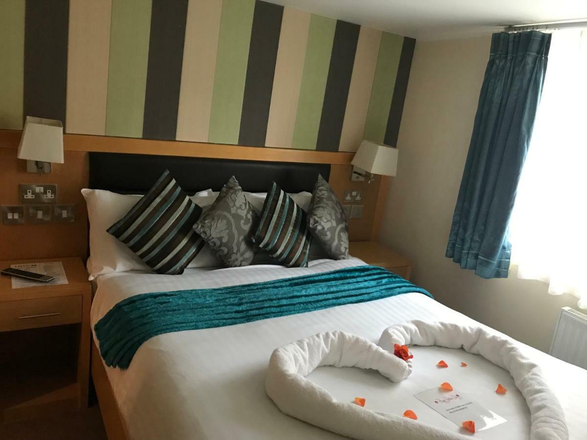 Iris Hotel Ландъндо Екстериор снимка